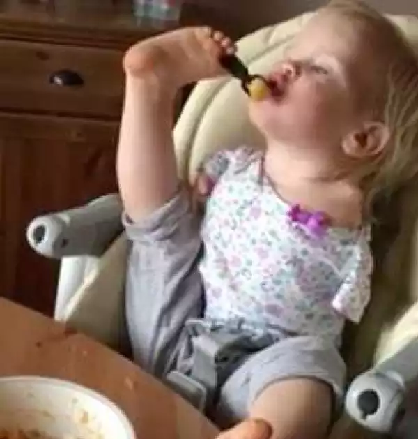 Photos: Baby girl born with no arms learns to eat by herself - using her feet